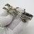 A substantial vintage miniature weighing 51 grams, depicting a Roman chariot with horses, handcrafted in Continental...
