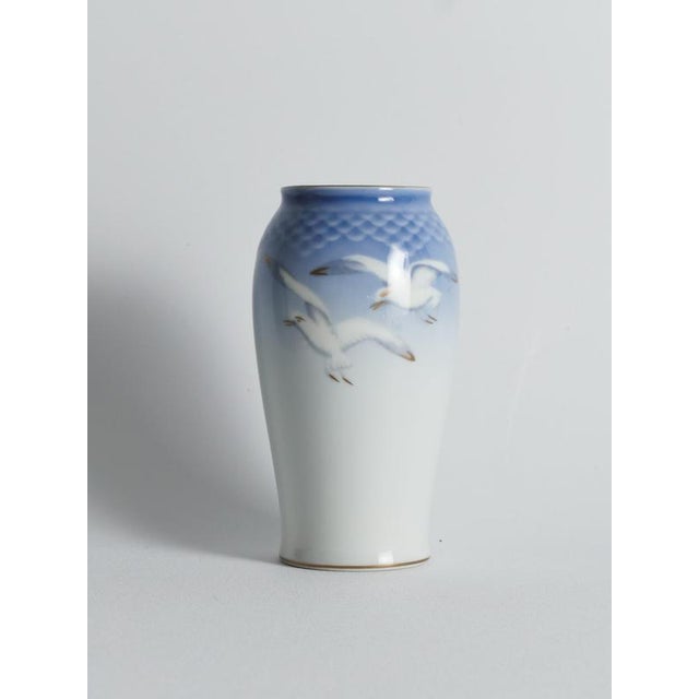 A beautiful vintage bing & gröndahl “seagull” (mågestellet) porcelain vase, denmark, decorated with the iconic seagull...