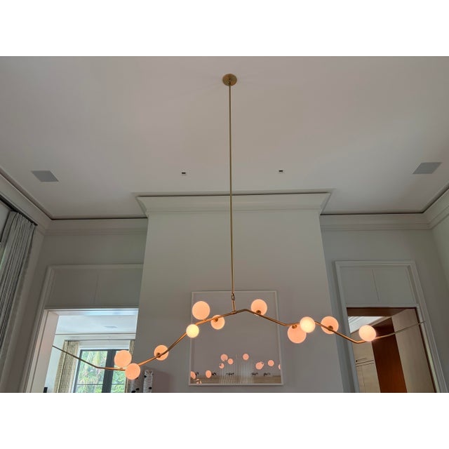 This chandelier was fabricated by Lindsey Adelman Studio as a bespoke variation of the CB0903 design, featuring an...
