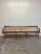 Fine, rare and incredibly crafted antique American spindled bench. The bench has a full row of spindles in the back which...