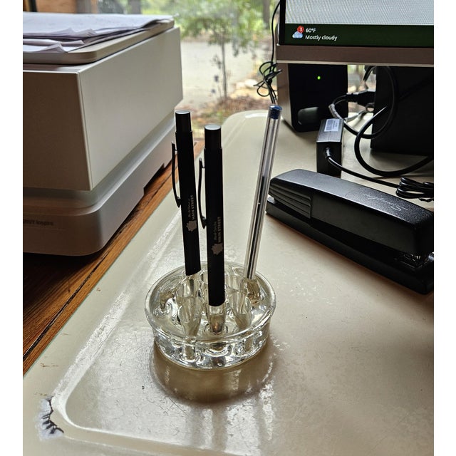 Bring timeless elegance to your floral arrangements with this vintage 11-hole glass flower frog. Crafted from clear,...