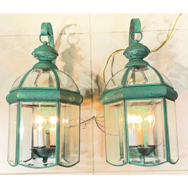 Add a touch of classic charm to your outdoor space with this pair of vintage brass lanterns. These meticulously crafted...