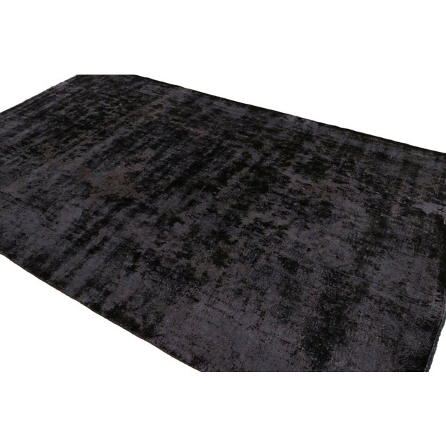 Hand knotted in wool circa 1960-1970, this 8×12 vintage Persian Kerman rug is from a special new Rug & Kilim curation of...