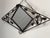 This diamond shaped Art Deco mirror offers a great functionality by having three hat or coat hangers, it is great for a...
