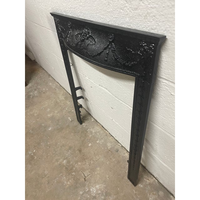 Early 19th Century 25.5" W X 30.5"h Cast Iron Cherub Decorative Fireplace SurroundPeerless Manufacturing Louisville KY...