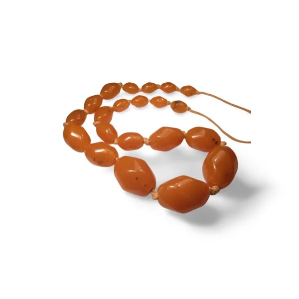 Antique natural Black Sea amber graduated bead necklace. This magnificent piece features 21 natural graduated Black Sea...