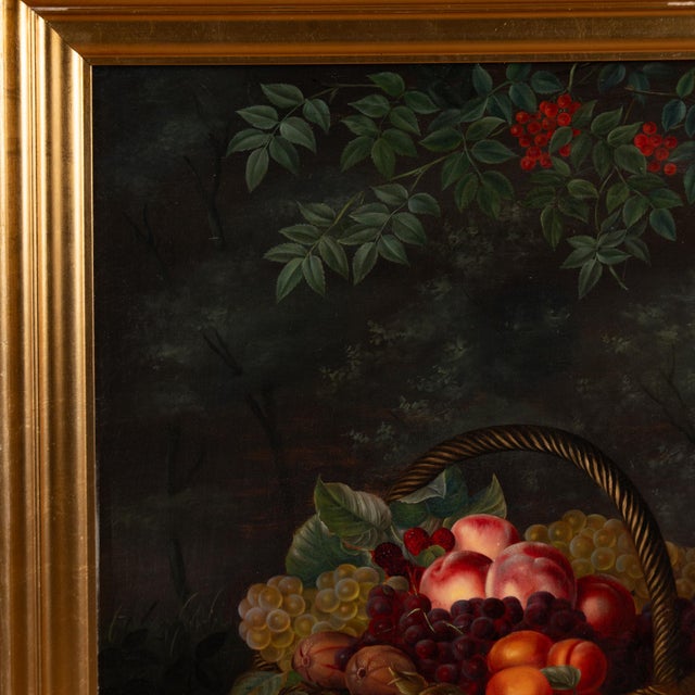 19th century original oil still life painting depicting fruit arranged in a basket. Painted in oil on canvas and presented...