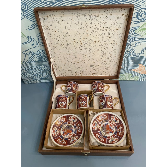 This is a lovely set of Imari tea cups and saucers by Pearl China. There are 5 cups snd 5 saucers in their original box....