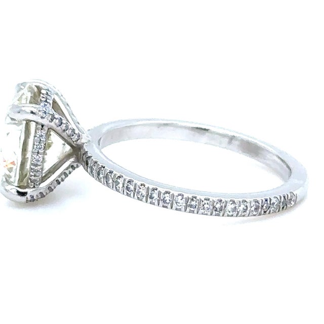 A breathtaking round brilliant cut diamond ring crafted in 18ct white gold and platinum, featuring an exceptional large...