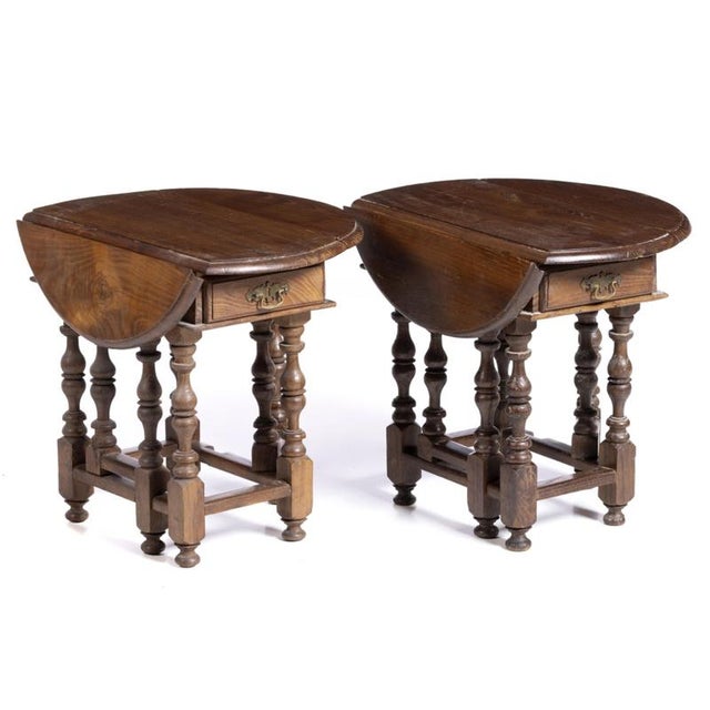 Two support tables portuguese, from the 20th century. With chestnut wood flaps. Signs of use. Dim.: (largest open) 50 x 57...