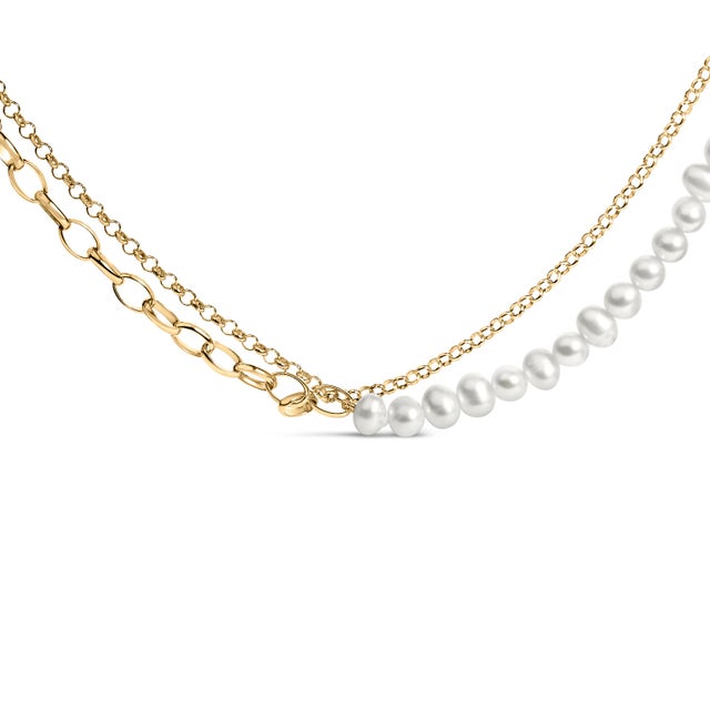 Discover the splendor of timeless elegance with this exquisite necklace, beautifully marrying the lustrous glow of...