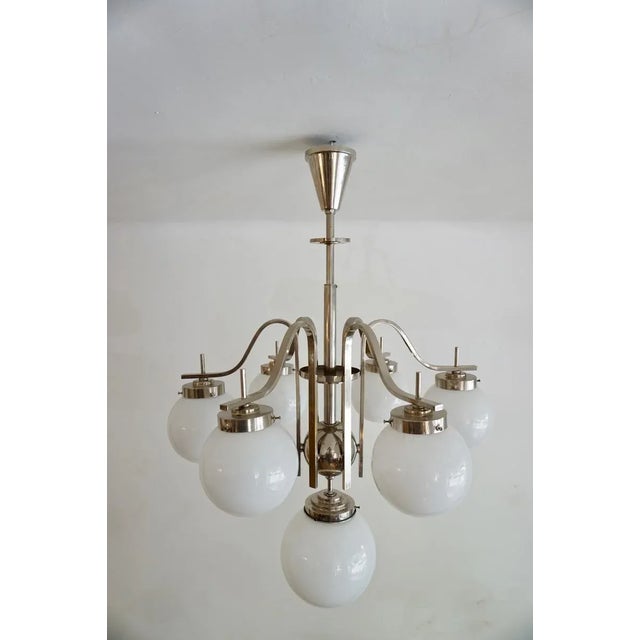 Hungarian Art-Deco chandelier. 1930s This is typical Hungarian art-deco chandelier. Such elements of the design as iron...