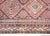 An exquisite early 20th-century antique Caucasian Shirvan rug hand-woven in Azerbaijan. This piece features a striking...