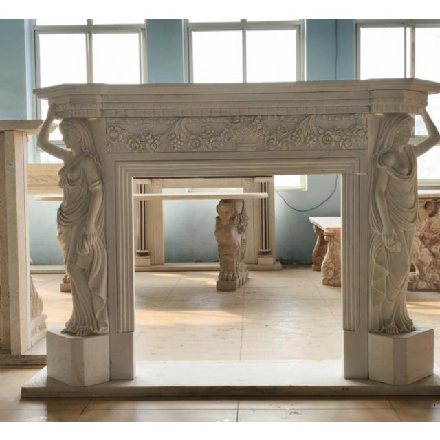 This magnificent neoclassical marble fireplace mantle showcases architectural grandeur and sculptural artistry at its...