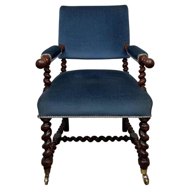 A superb and highly decorative 19th-century English Victorian armchair, finely constructed in oak and distinguished by its...