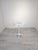 Marble coffee table with a whitewashed cast iron leg Round coffee table with a marble top on a painted cast iron leg. The...