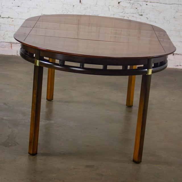 Brown Mid-20th Century MCM to Campaign Style Round to Oval Expanding Dining Table Attributed to Tung Si Collection by Hickory Manufacturing For Sale - Image 8 of 18
