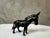 A charming little bronze sculpture from the 1950s depicting a donkey, rendered with great simplicity and expressiveness....