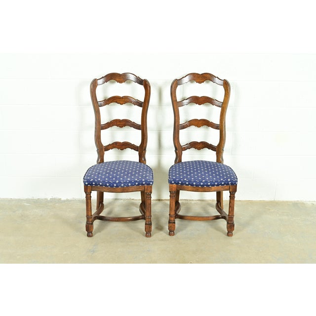 A gorgeous pair of French Country, French Provincial, or William and Mary style ladder back side chairs or dining chairs...