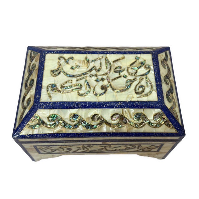This authentic handmade jewelry box is crafted from natural wood and fully inlaid with genuine Mother of Pearl, framed...