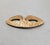 1960s goldtone raised foliate design Venetian mask brooch with security clasp. Marked "NAPIER©." Measures: 1 1/8 inches...