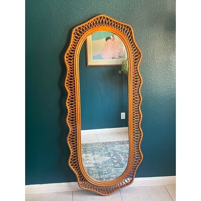 Eye-catching wall mirror to reflect your boho style! This pretty piece of decor is full length at 64 inches so you can see...