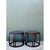 This pair of vintage McGuire rattan drum side tables presents a striking cylindrical silhouette, each piece constructed...