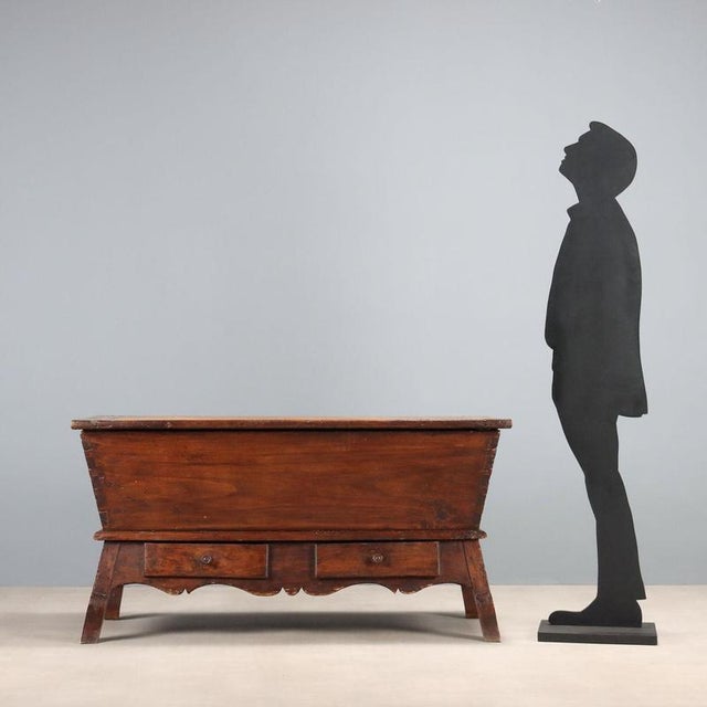 Poplar sideboard with a walnut stain. Two parts, a freestanding top, a base with two front drawers, and curved feet....