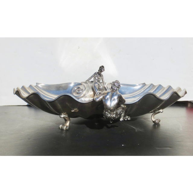 Italian circa 1930s 800 silver center bowl. High style Art Deco motif of the satyr attending the water Nymph or bather....