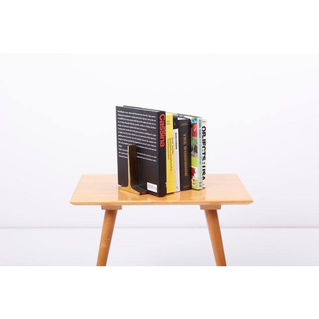 Modernist bronze bookends by Ben Seibel. This piece is attributed to the mentioned designer/maker. It has no attribution...