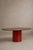 A sculptural table, defined by the encounter between the natural richness of solid walnut and the graphic presence of the...