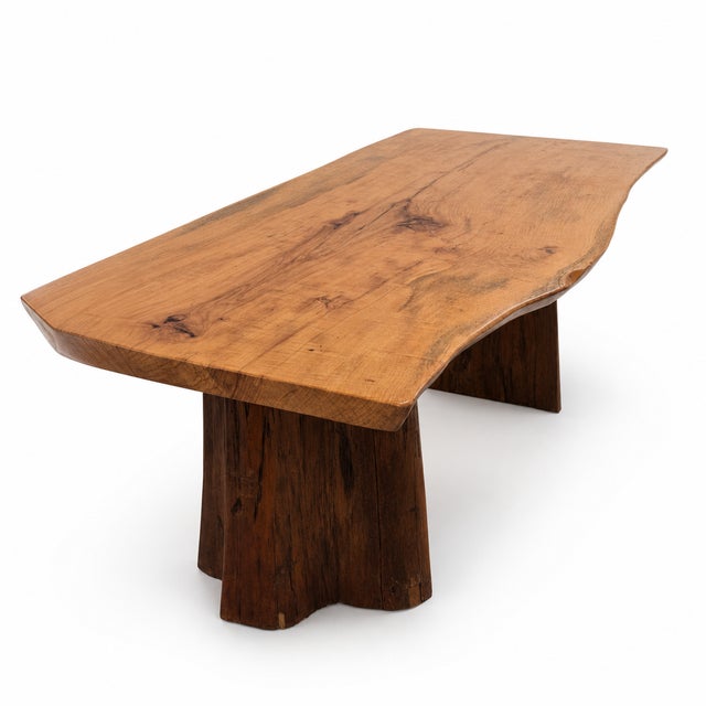 This stunning handcrafted dining table is made from a solid natural wood slab with dramatic grain movement, organic live...