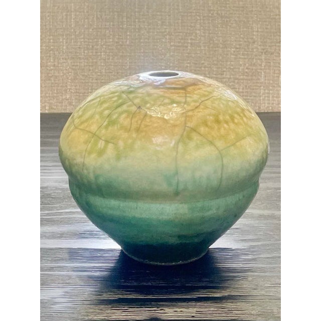 Vintage Raku studio pottery vase by renowned Potter, Joe Winter, Reno Nevada, signed on the underside. Circa, early 1980s....