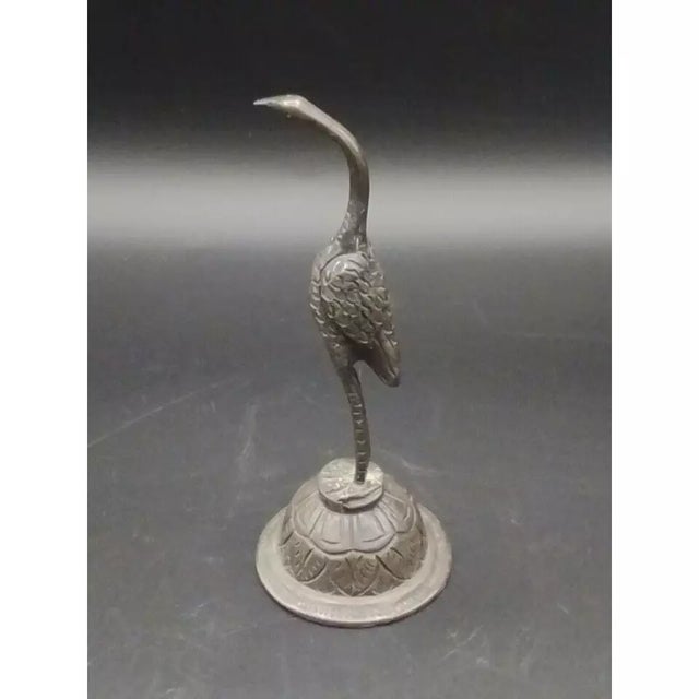 This auction is a wonderful rare full body figural egret hand bell made by Sanborns, one of the leading 20th century...