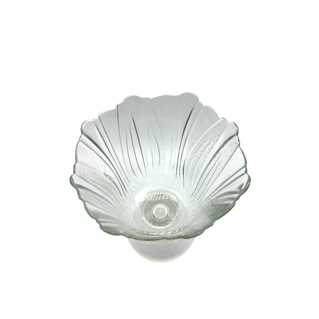 An impressive antique pressed-glass celery vase distinguished by its combination of finely stippled panels, bold vertical...