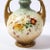This stunning and graphic Art Nouveau vase was realized in Austria circa 1910. It features a circular base with a gourd...