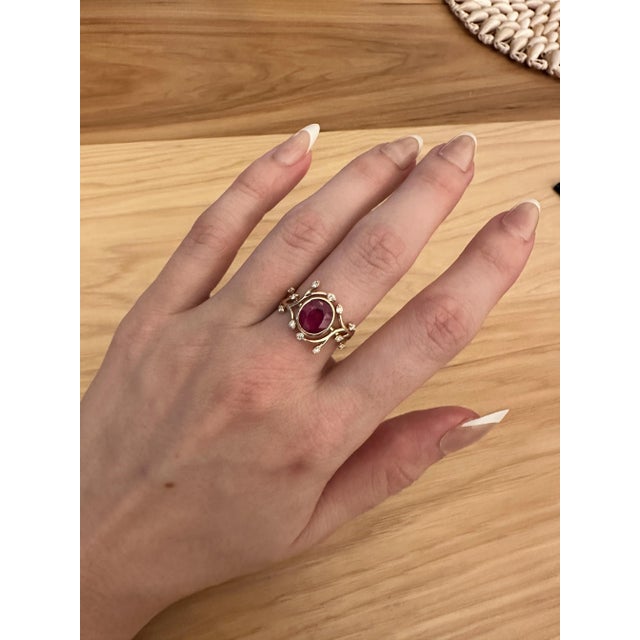 This exquisite Burma Ruby Ring is crafted with Solid 14k Yellow Gold, and features diamond accents for a perfect contrast....