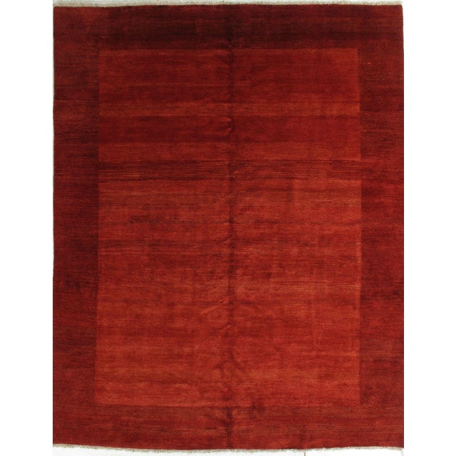 Vintage hand-knotted Persian Gabbeh rug featuring a bold, minimalist field with a contrasting border. Gabbeh rugs,...