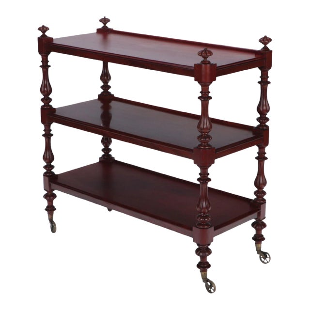 An English Mahogany 19th Century Three Tier Dessert on Wheels Having Shaped and Carved Columns. For Sale