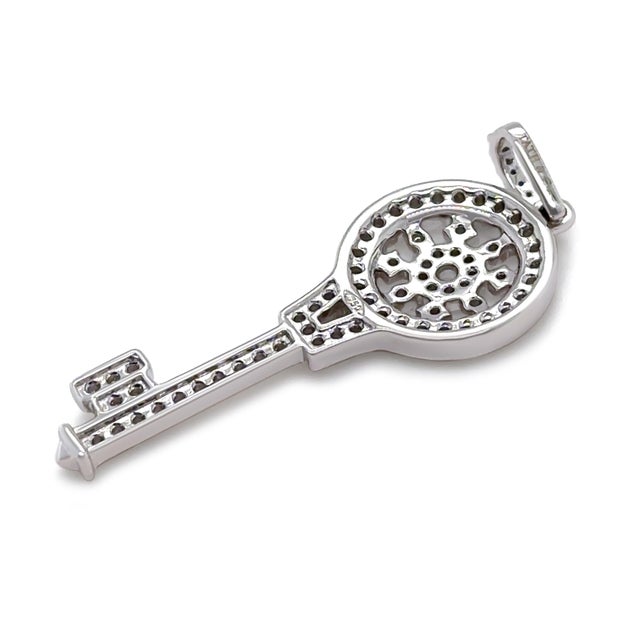 An elegant diamond key pendant crafted in 18ct white gold, featuring a decorative key design embellished with micro pavé-...