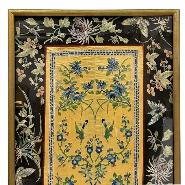 The item shown in the image is an antique Chinese silk embroidered robe sleeve panel, dated from the late Qing Dynasty...