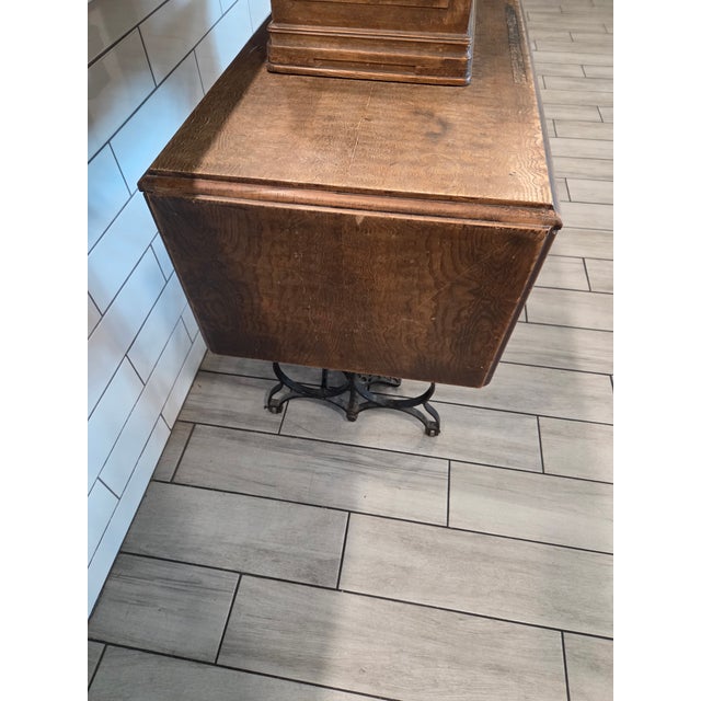Metal Antique Davis Treadle Sewing Machine in Wooden Cabinet With Ornate Cast Iron Base, Late 19th Century For Sale - Image 7 of 14