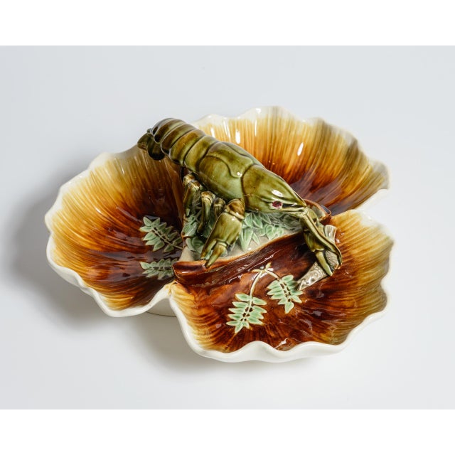 This is a stunning and rare French majolica Crawfish on a triform centerpiece bowl crafted by the renowned Choisy-le-Roi...