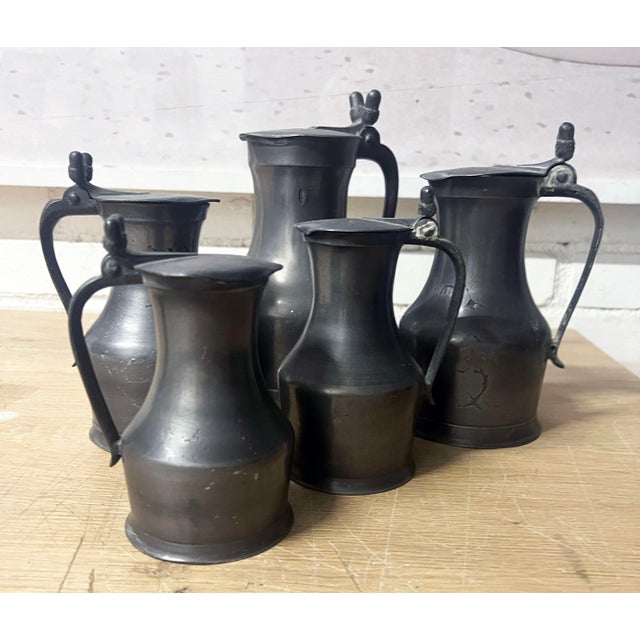 Five Pieces ofAntique 19 th Century French Pewter Lidded Tankards. Wonderful twin acorn motif at thumb piece to open flat...