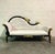 A stunning Rococo-style chaise lounge featuring exquisite craftsmanship and luxurious detailing. The hand-carved frame is...