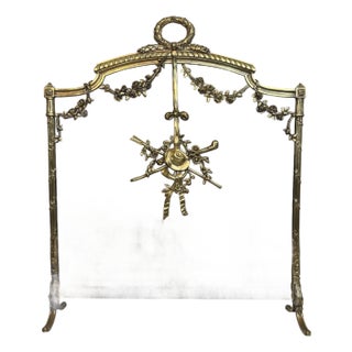 Louis XVI style brass fire screen with mesh decorated with garlands For Sale