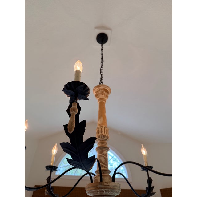 Add timeless Old World character with this elegant Spanish Colonial-inspired chandelier. Featuring a beautifully carved...