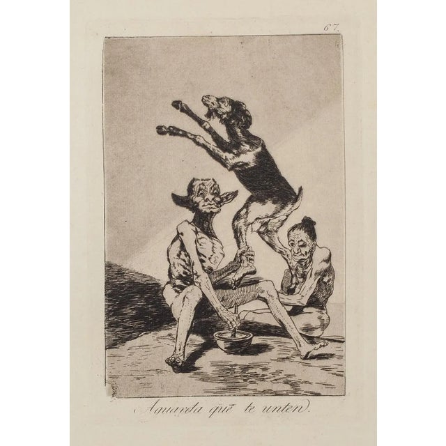 Aguarda que te unten - Origina Etching and Aquatint by Francisco Goya - 1868 1868 For Sale