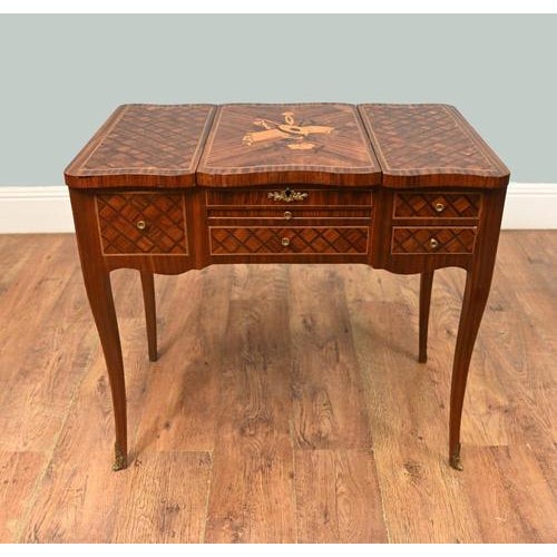 A very elegant late 19th century French bonheur du jour / dressing table in the Louis XVI manner, veneered in richly...