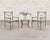 A refined set of Restoration Hardware “Catalina” dining chairs, constructed in a neoclassical garden style having an iron-...